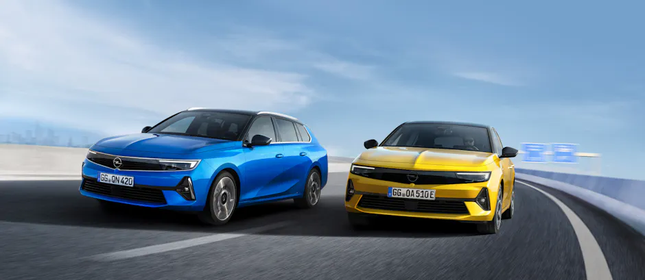 Opel Astra Sports Tourer yellow & blue driving