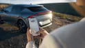 Application Kia Connect, en arrière-plan une Kia EV6