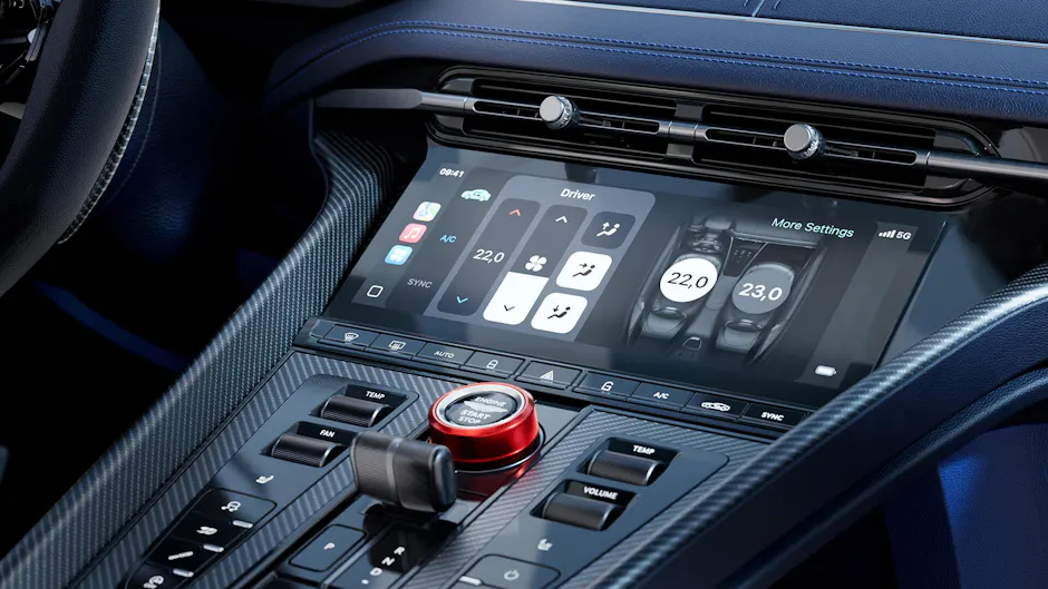 Zentraler Touchscreen des DB12 S mit Klimafunktionen und Carbon-Umrandung.