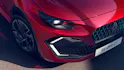 Frontscheinwerfer und Felge des Renault Clio, sportliche Details.