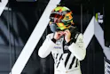 Il pilota del TeamPeugeot in tuta da corsa